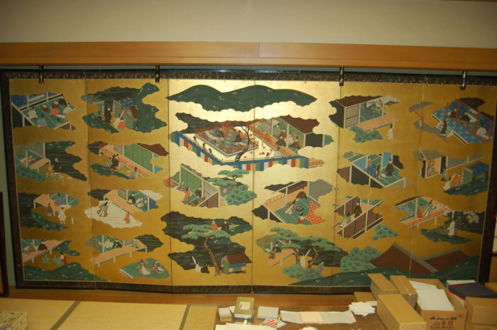 An exquisite example of gold leaf work on a folding screen.