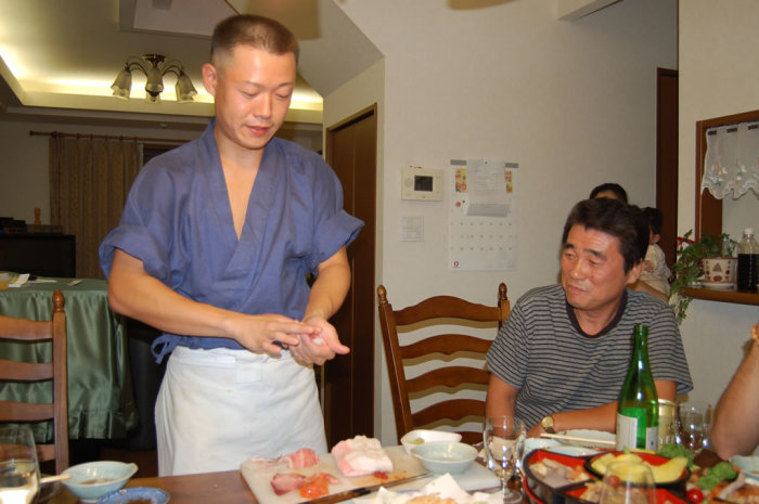 Chef son-in-law prepares our sushi while Host Father looks on approvingly.